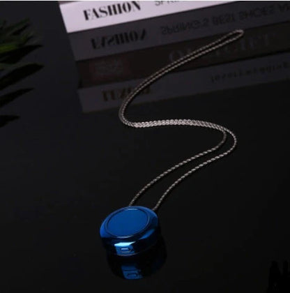 Portable negative ion air purifier necklace in blue, white, and silver options