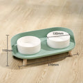 Green adjustable pet bowl set with tilted double compartments for food and water feeding