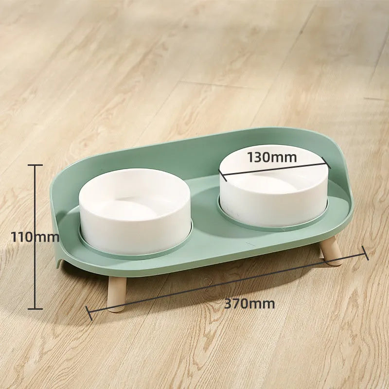 Green adjustable pet bowl set with tilted double compartments for food and water feeding