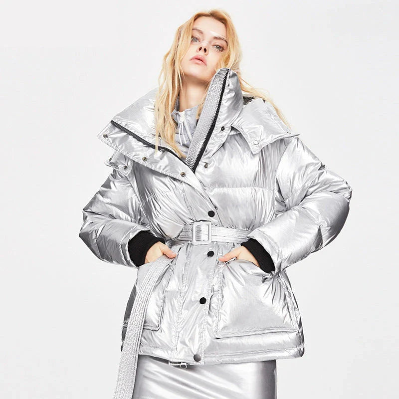 Women's mid-length white duck down jacket with silver shiny finish, hooded design for winter warmth