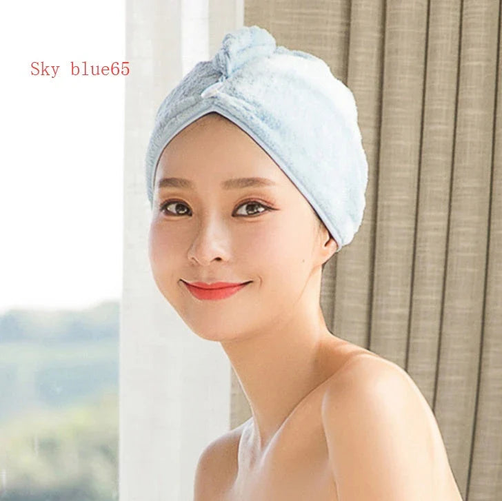 Absorbent microfiber hair turban in various vibrant colours, designed for fast and convenient drying