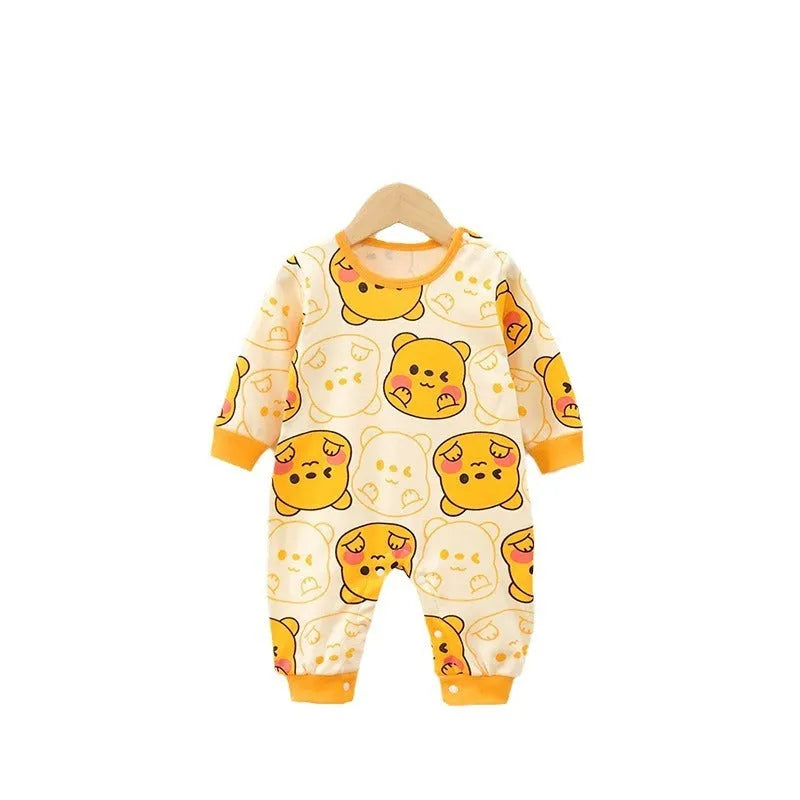 Cotton long sleeve baby jumpsuit in size 73cm with fun print, neutral unisex design for spring autumn