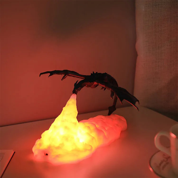 3D printed red dragon night light glowing on a table, showing detailed scales and wings, with a USB cable.