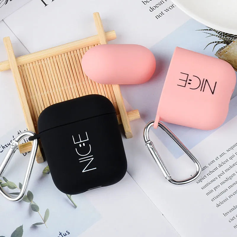 Apple AirPods PC back cover case with decorative designs in black and pink colours