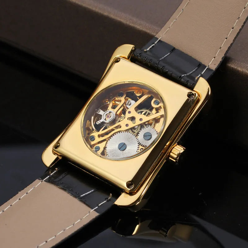 Winner men's Swiss hollow manual mechanical watch with rectangular alloy case and leather strap on white background