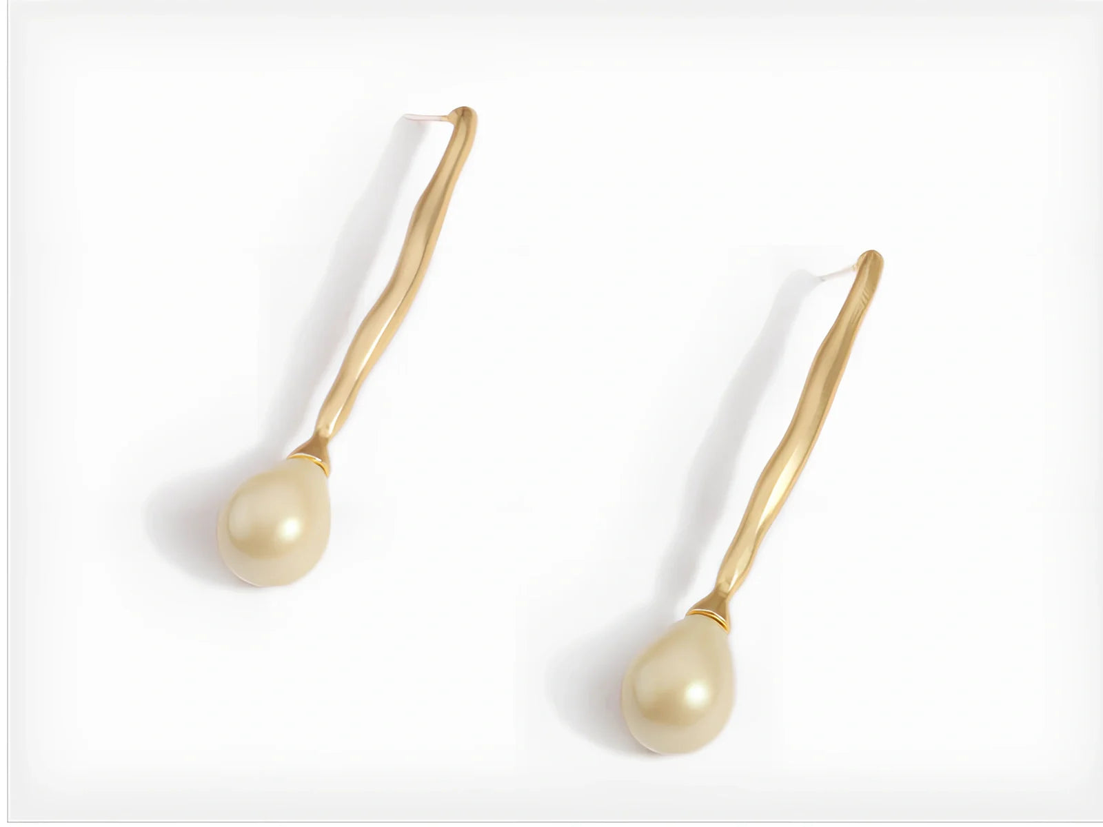 Simple gold alloy pearl earrings with 6mm cultured pearls and butterfly clasp