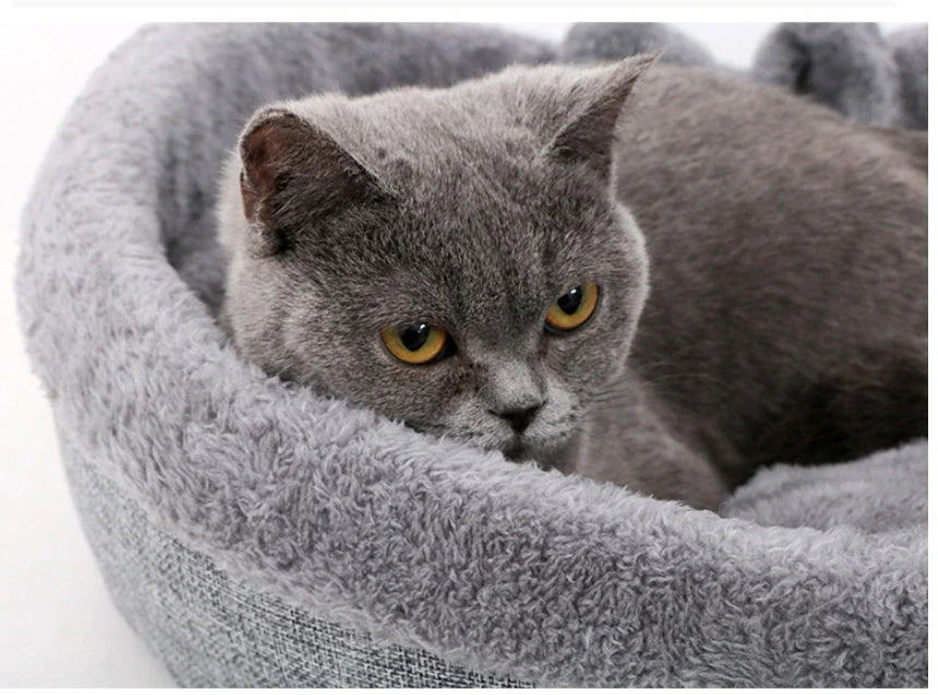 Cozy heart-shaped pet bed in grey and pink colors, designed for small, medium, and large dogs and cats