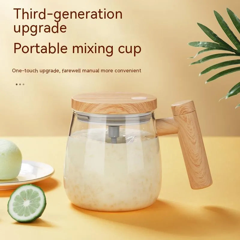 400ml automatic self-stirring coffee mug in borosilicate glass with electric mixing button.