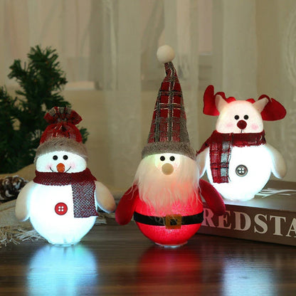 Glowing LED Christmas ornaments with Santa Claus, snowman, and deer designs for a festive holiday tree or home decor