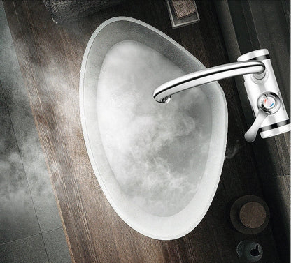 Electric instant water heater tap with adjustable temperature settings