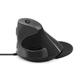 Black and white ergonomic vertical mouse with wired USB cable on a desktop.