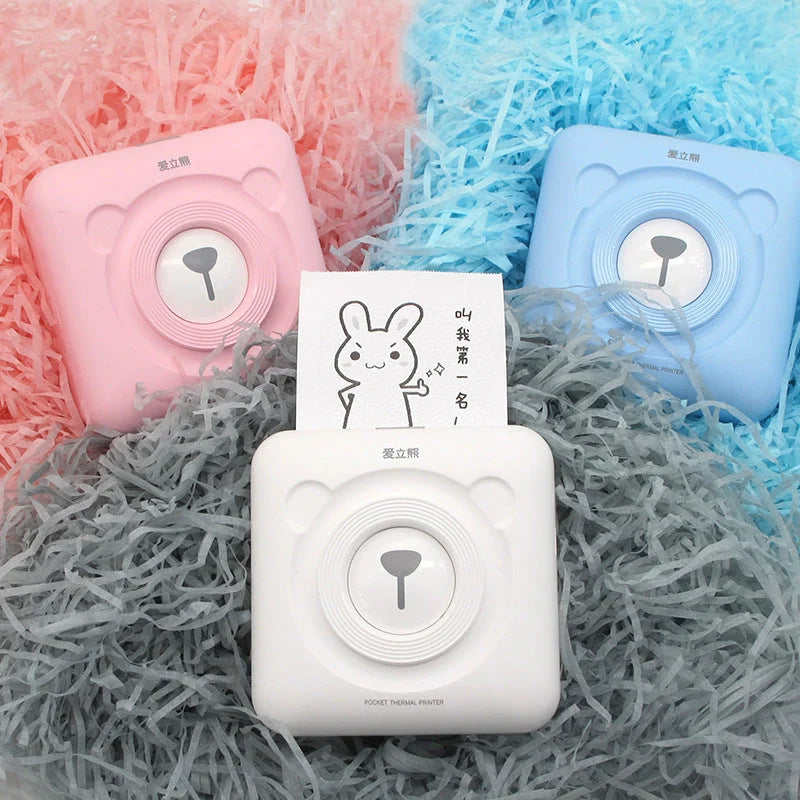 Portable handheld label mini thermal printer in white, pink, or blue
