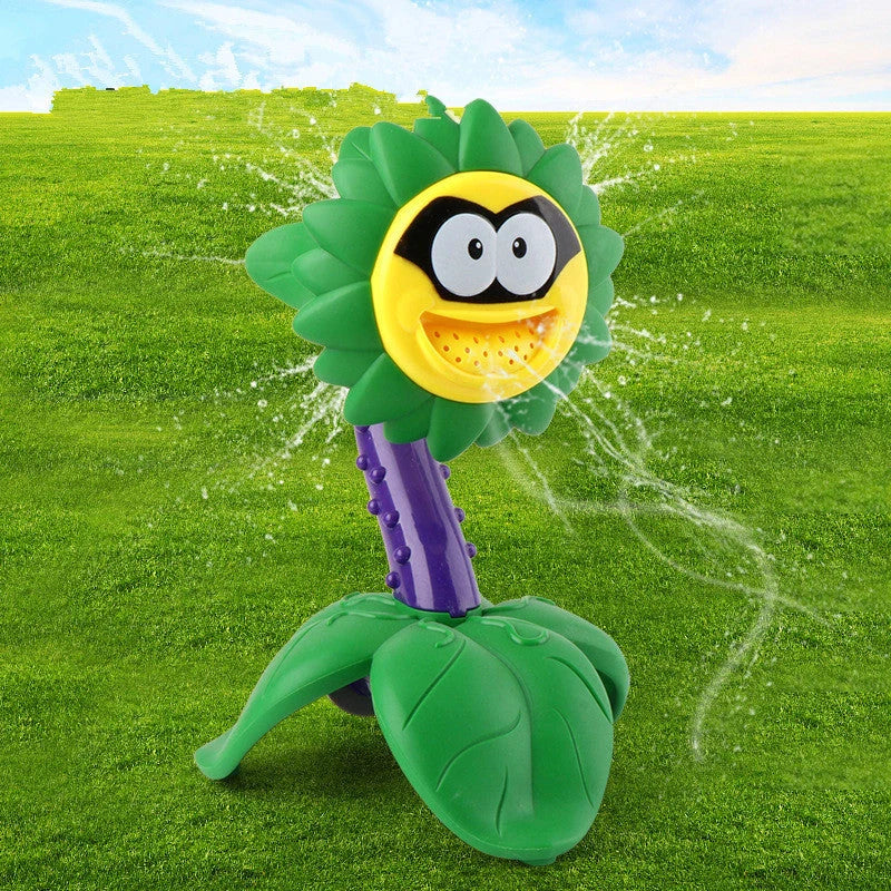 Cartoon sprinkler toy for babies with rotating water spray feature
