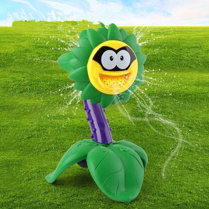 Cartoon sprinkler toy for babies with rotating water spray feature
