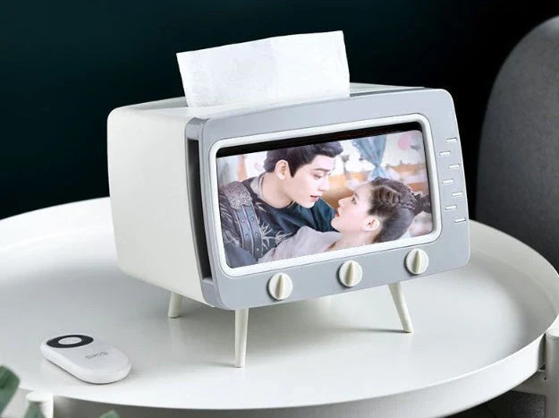 Charming cartoon tissue box organizer in various colors, with integrated phone stand for hands-free media viewing
