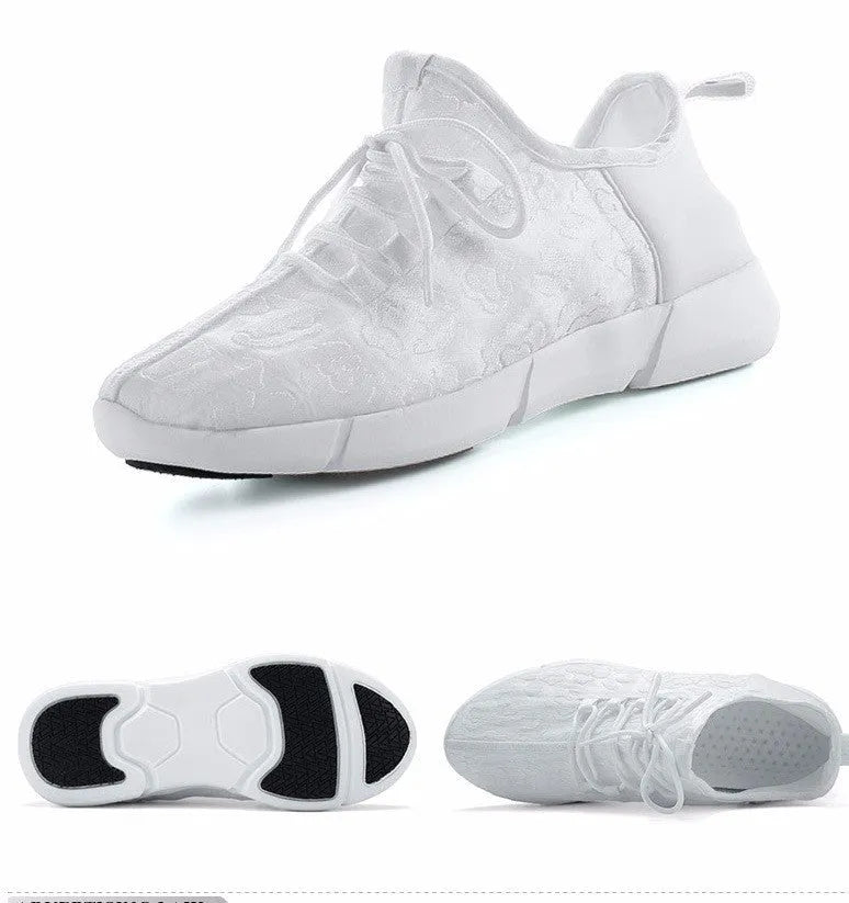 Casual loafers for men and women with fly woven upper, flat heel, and luminous accents in white colour option