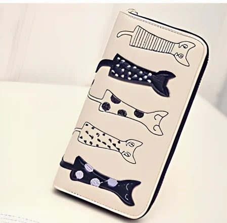 Black women's fashion wallet open showing six card slots and zipped note compartment, 10 cm wide genuine leather