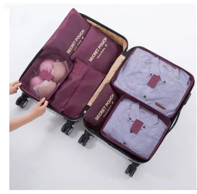 Durable waterproof packing cubes in various colors for organized, efficient travel