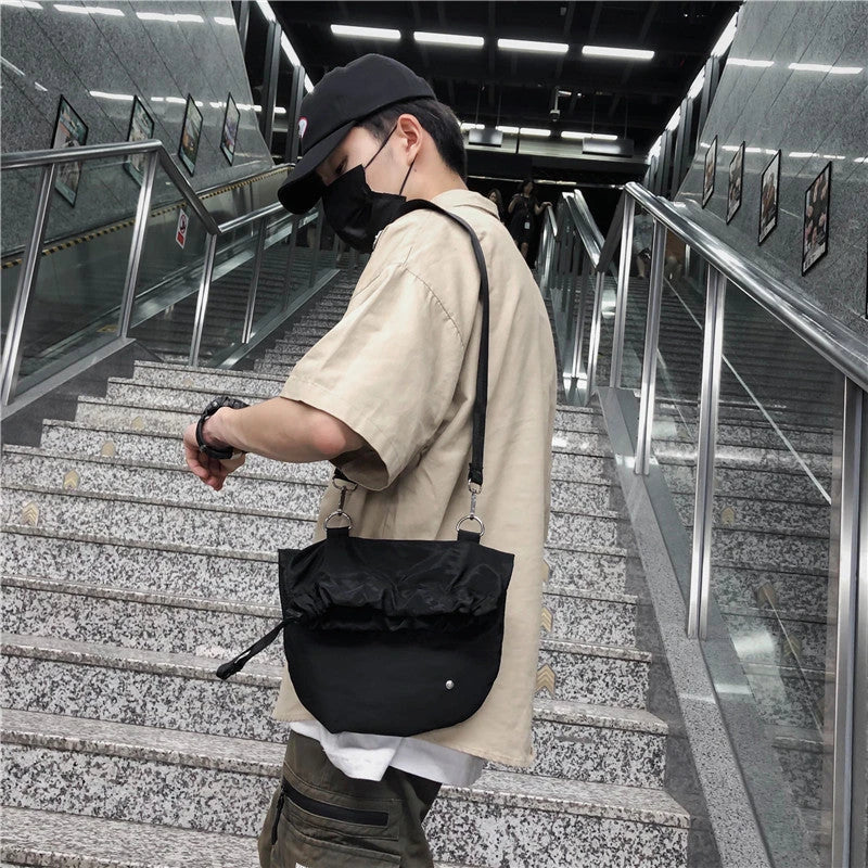 Diagonal Drawstring Fabric Waist Bag in Light Grey, Orange, and Black