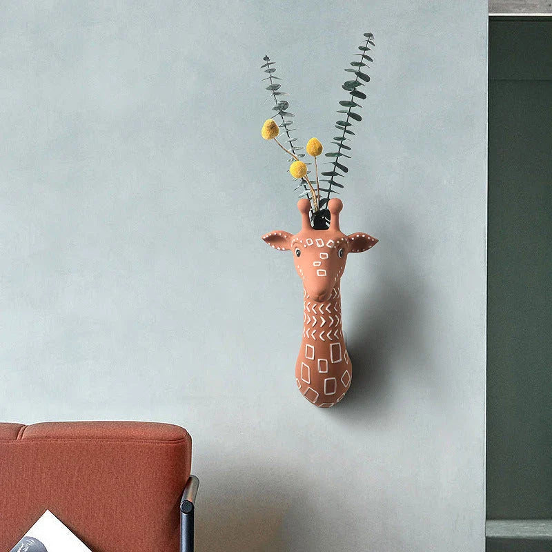 Ceramic animal-shaped wall vases in rabbit, brown bear, and giraffe designs for stylish home decor