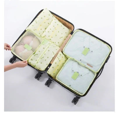 Durable waterproof packing cubes in various colors for organized, efficient travel