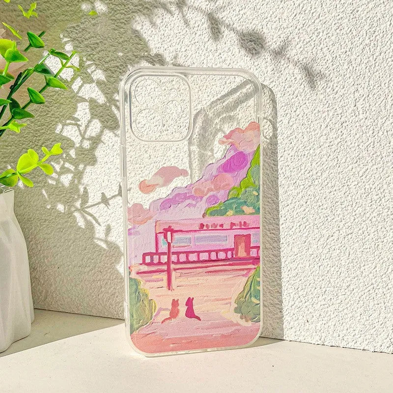 Colourful soft silicone iPhone case with a printed cartoon design of two cats.