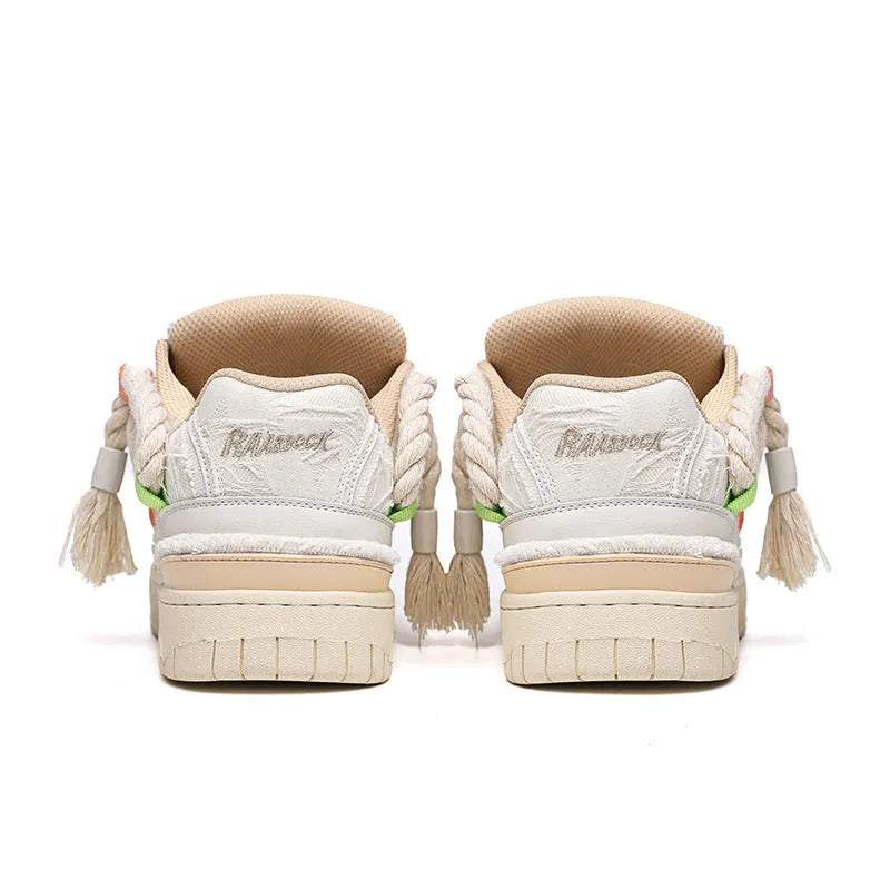 Creamy white retro skate shoes with old damage lace detailing and rubber soles