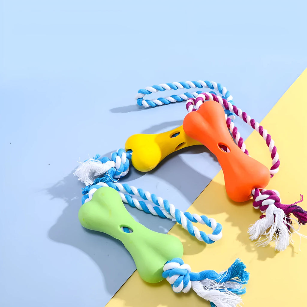 Green knotted rope bone dog toy with porous texture for holding beef strips and cheese treats