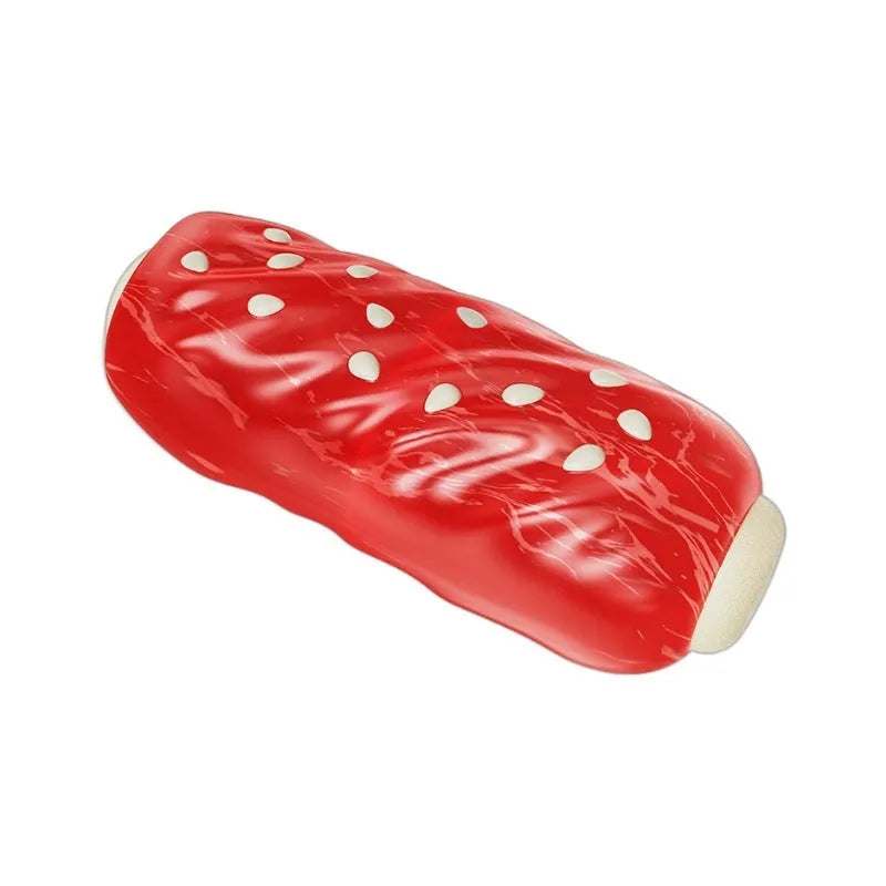 Primary colour bone-shaped dog chew toy with textured rubber cleaning surface.