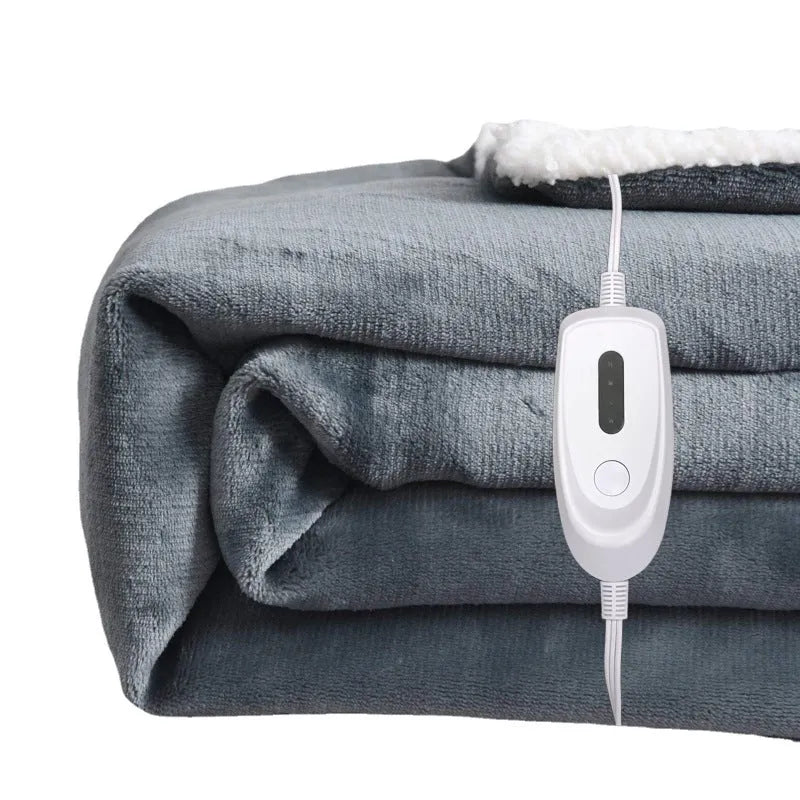Grey and white USB electric heating blanket with intelligent temperature control, shown on a sofa.