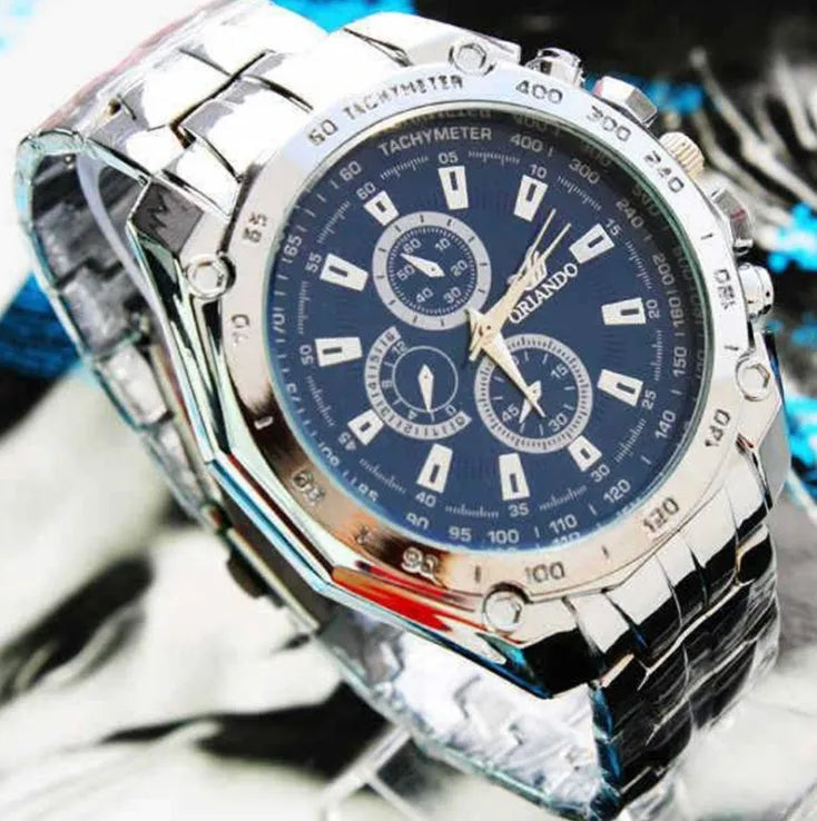 Men's stainless steel sport watch with 4cm dial and pointer display on a casual background