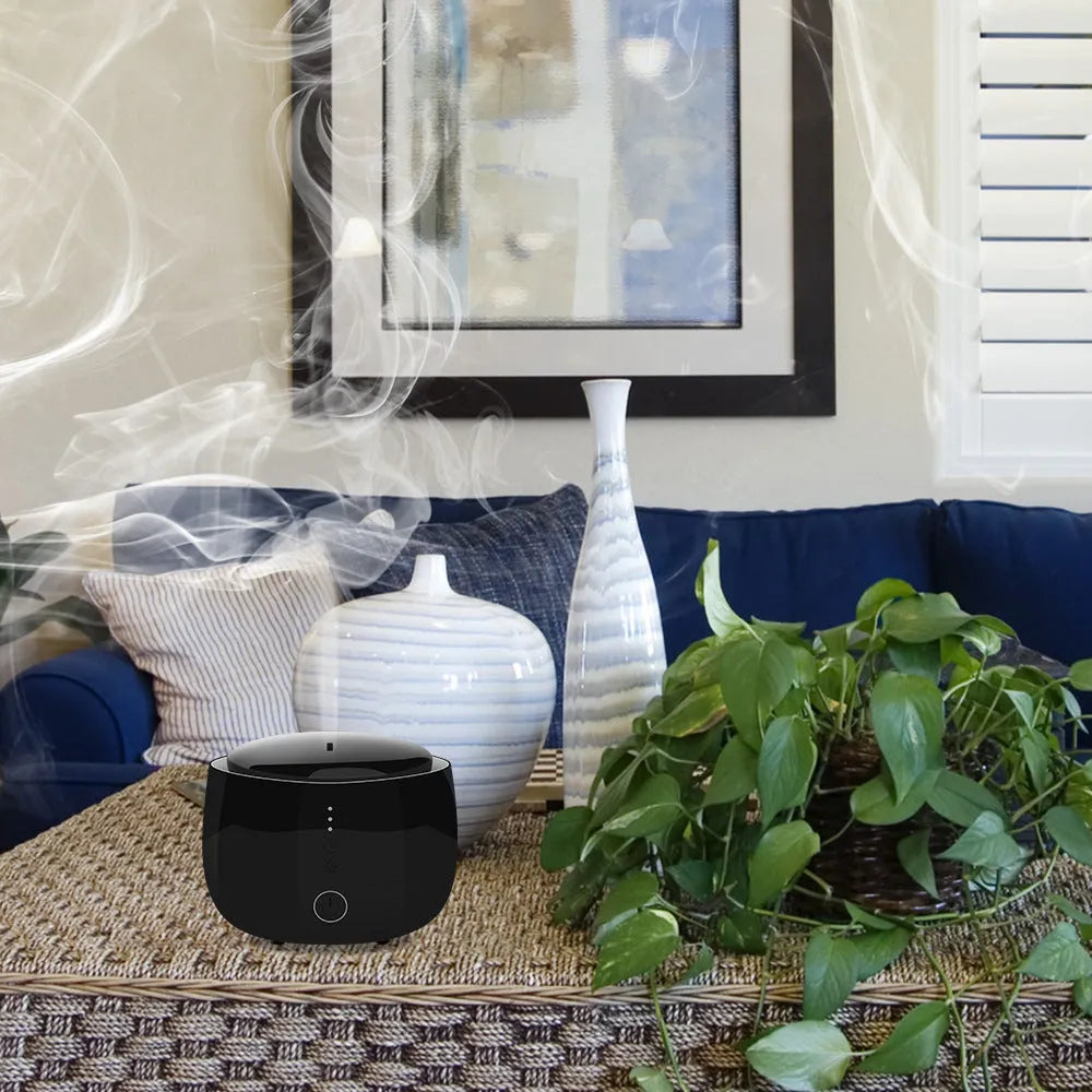 Smart home aromatherapy humidifier with 300ml tank, air purifier, and colourful LED lights in black