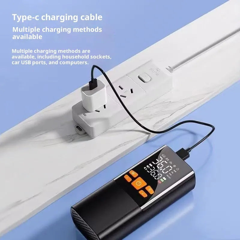 Wireless black tyre inflator with ABS body, tire pressure gauge, and warning light on a car tyre