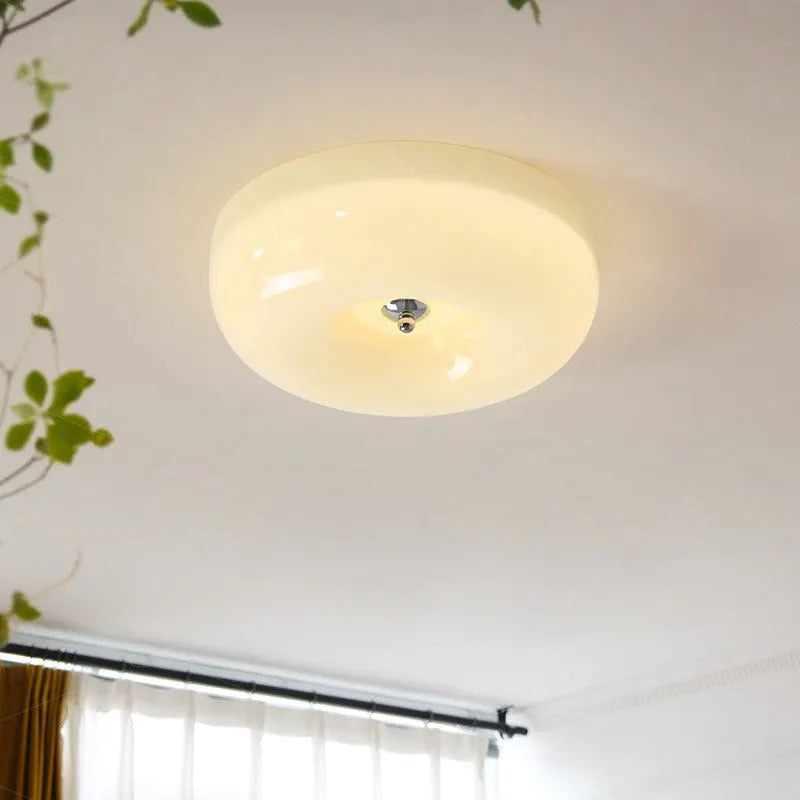 Cream-coloured American antique style ceiling lamp with a three-colour light function.