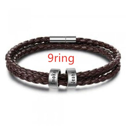 Personalized braided leather bracelet with engraved charm for men, available in black, brown, and navy colors