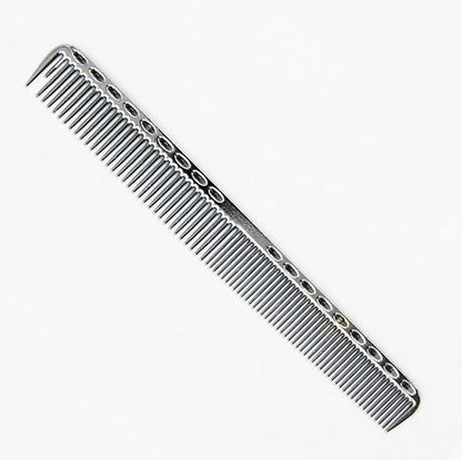 Space aluminium haircut comb in rose gold finish showing precise tooth spacing and polished metal surface