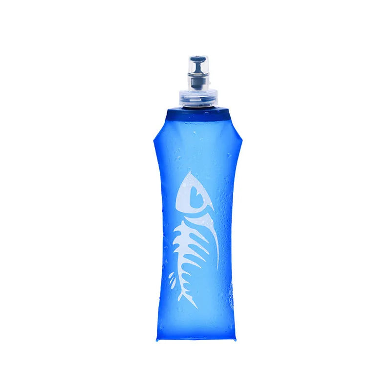 Blue sports soft water bottle with silicone lid on outdoor ground
