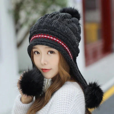 Knit fleece beanie with ear flaps and pompom in various colours for winter warmth