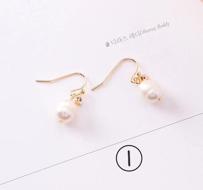 Vintage geometric pearl asymmetric earrings with 925 silver hooks, perfect for adding elegance to any outfit.