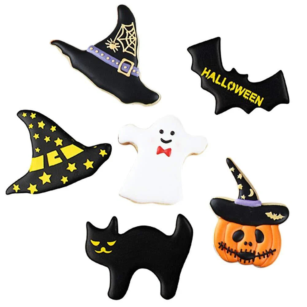 7-piece stainless steel Halloween cookie cutter set including pumpkin, bat, and skull shapes