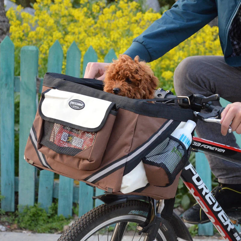 Pet bicycle carrier with removable basket for small cats and dogs, featuring reflective strips