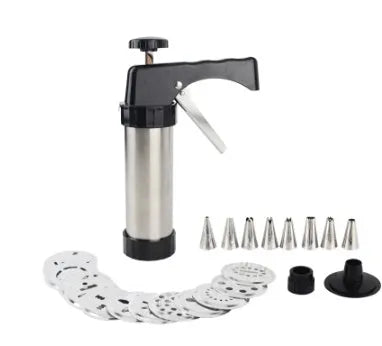 Stainless steel biscuit press gun with assorted cookie moulds and piping nozzles for baking.