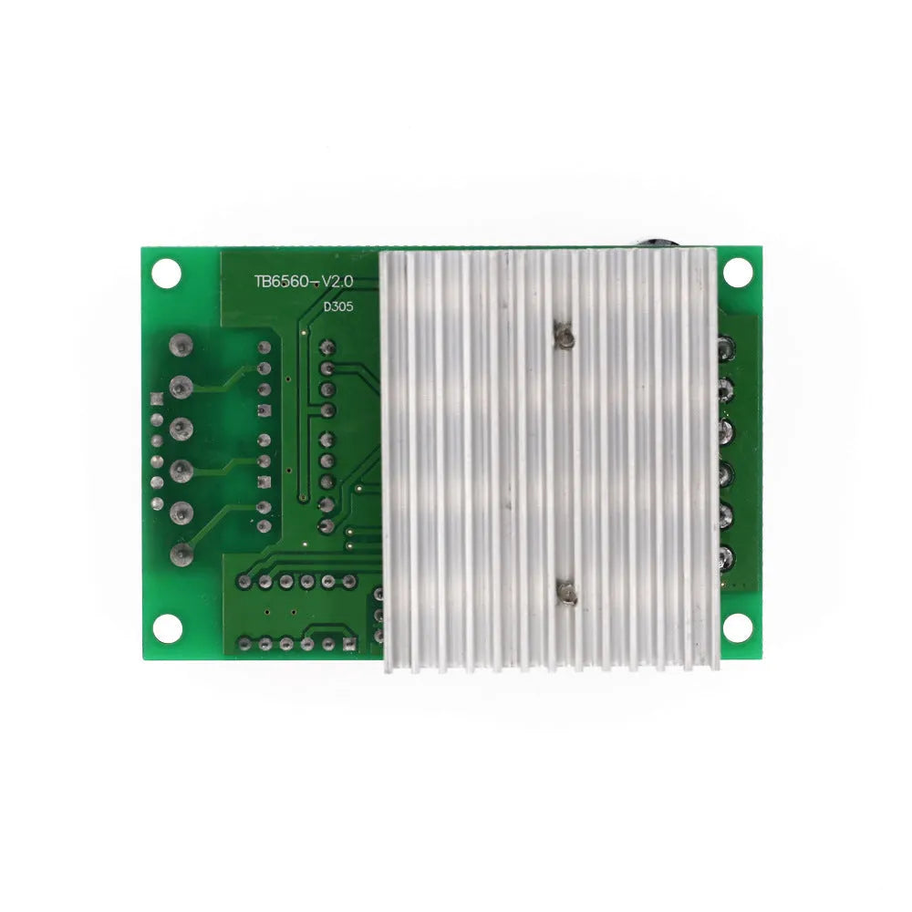 TB6560 stepper motor driver module on a green PCB with a large heatsink, showing connection terminals.