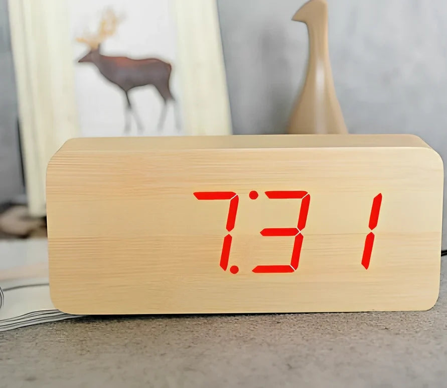 Rectangular wooden alarm clock 21cm long with LED display showing time, date, temperature rotation and voice control buttons