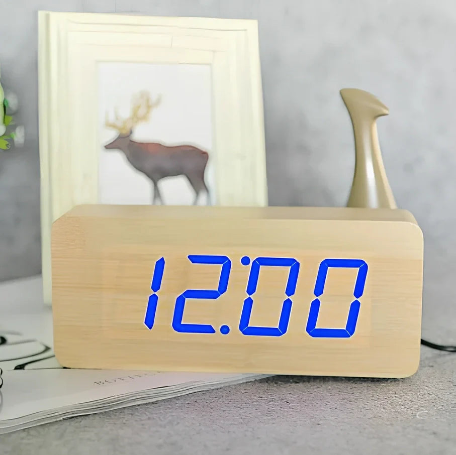Rectangular wooden alarm clock 21cm long with LED display showing time, date, temperature rotation and voice control buttons