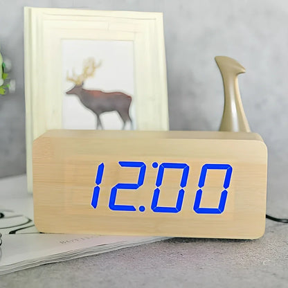 Rectangular wooden alarm clock 21cm long with LED display showing time, date, temperature rotation and voice control buttons