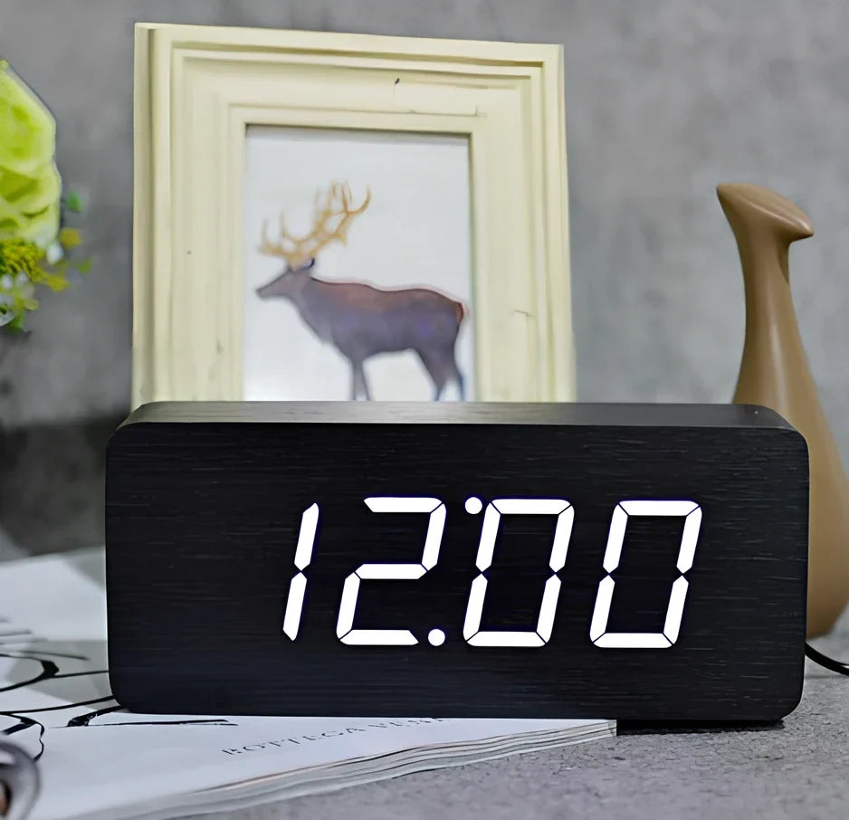 Rectangular wooden alarm clock 21cm long with LED display showing time, date, temperature rotation and voice control buttons