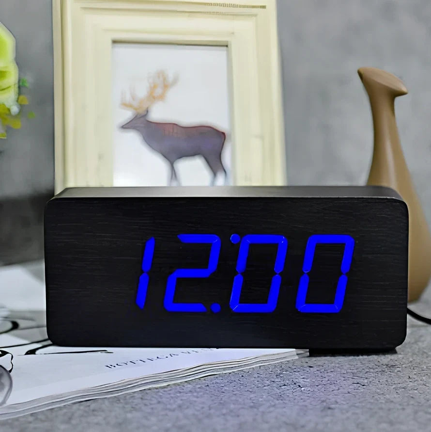 Rectangular wooden alarm clock 21cm long with LED display showing time, date, temperature rotation and voice control buttons