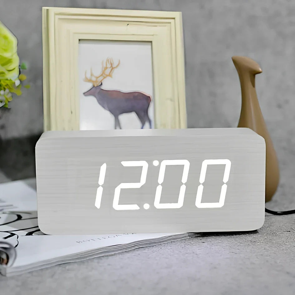 Rectangular wooden alarm clock 21cm long with LED display showing time, date, temperature rotation and voice control buttons