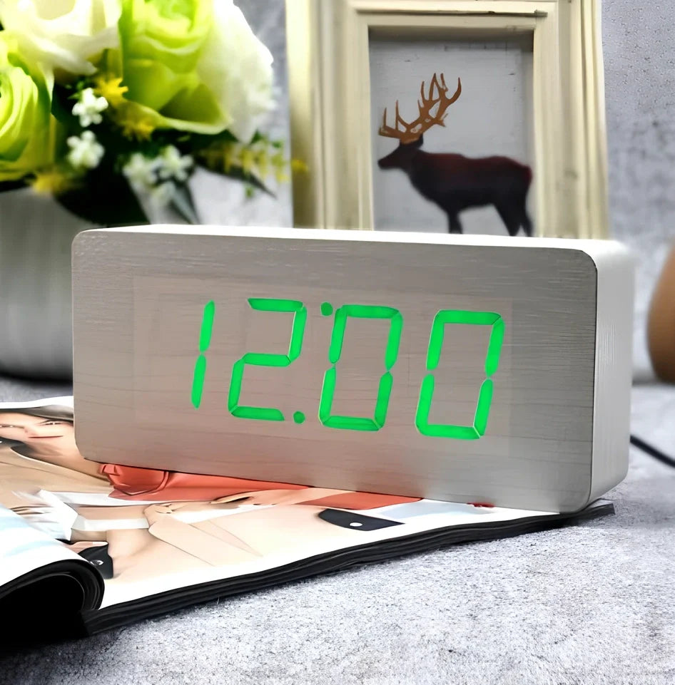 Rectangular wooden alarm clock 21cm long with LED display showing time, date, temperature rotation and voice control buttons